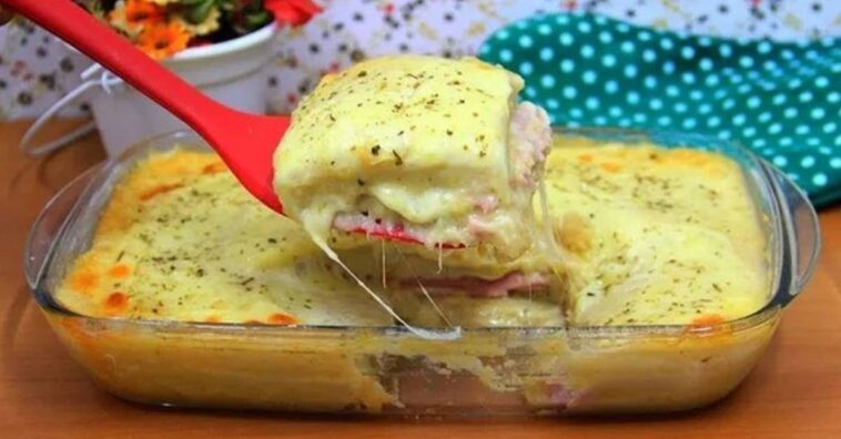 pastel de patatas relleno con jamón y queso al horno